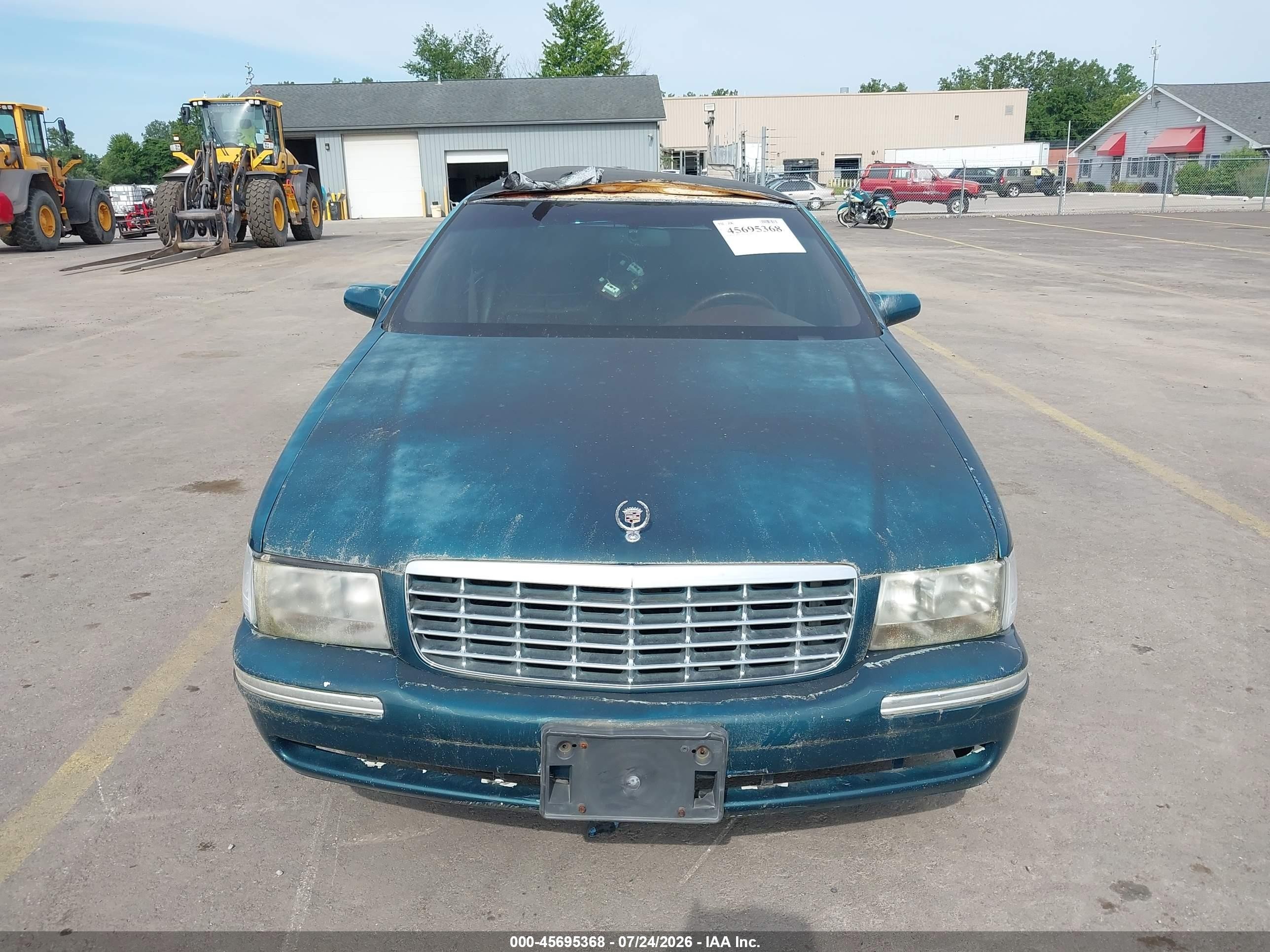 1997 Cadillac Deville Professional   Green vin: 1GEEH90Y4VU700443