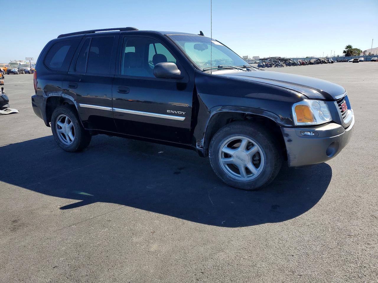 2006 Gmc Envoy Black vin: 1GKDS13S362332224