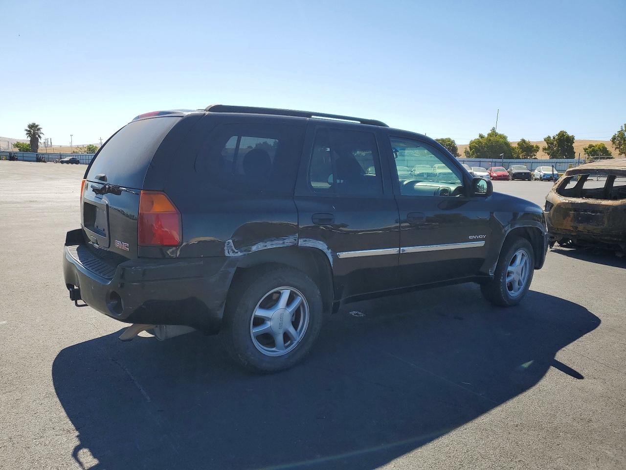 2006 Gmc Envoy Black vin: 1GKDS13S362332224