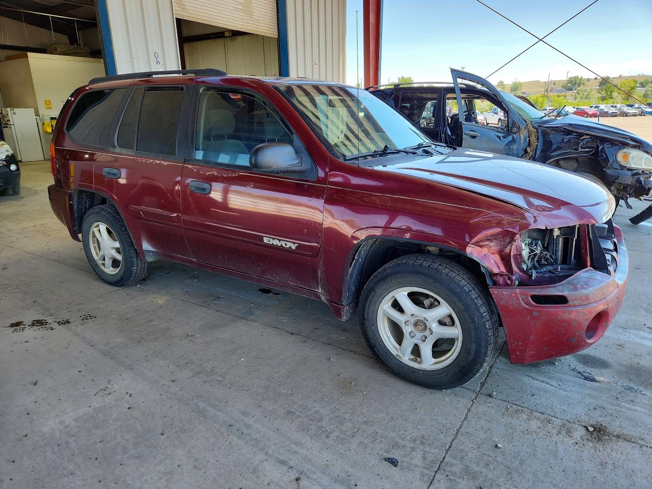 2004 Gmc Envoy Burgundy vin: 1GKDT13S042117619
