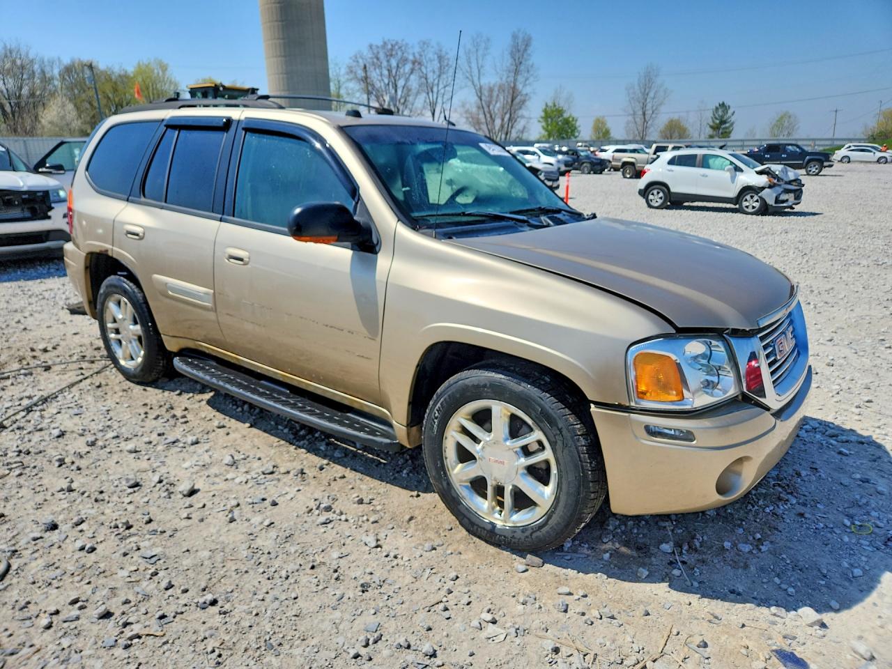 2005 Gmc Envoy Gold vin: 1GKDT13S152257650