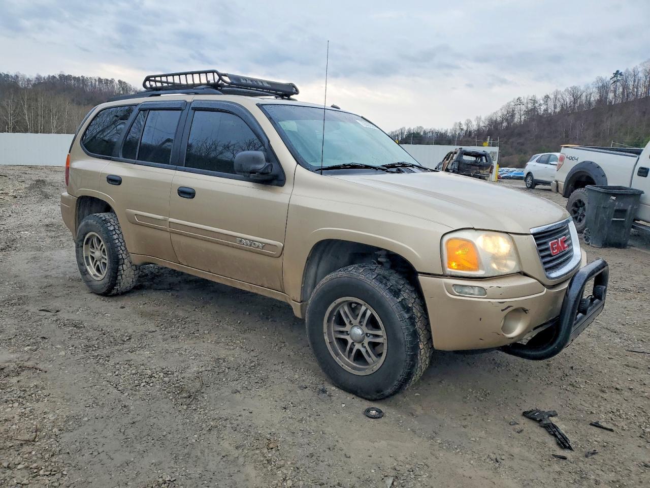 2004 Gmc Envoy Gold vin: 1GKDT13S242212585