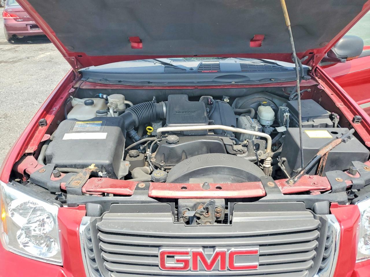 2004 Gmc Envoy Maroon vin: 1GKDT13S542443545
