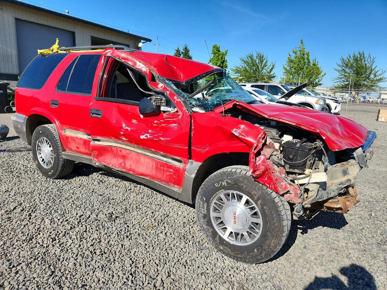 1999 Gmc Jimmy Red vin: 1GKDT13W2X2533890