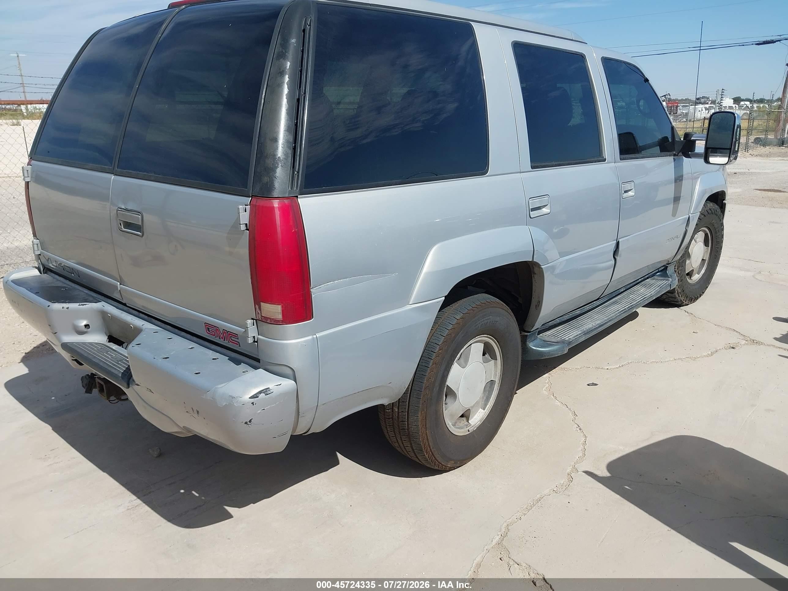 2000 Gmc Yukon Denali   Silver vin: 1GKEK63R7YR223371