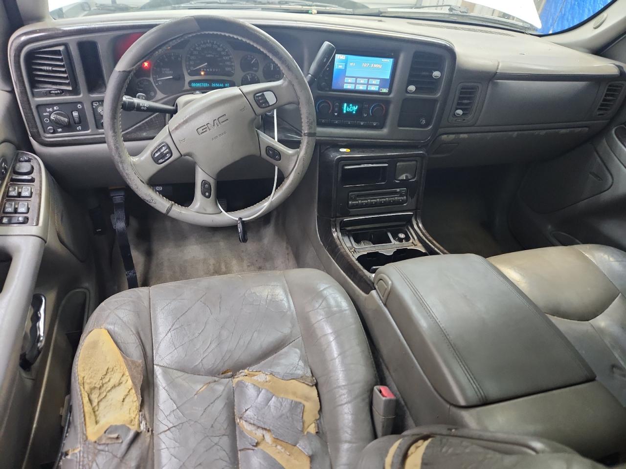 2006 Gmc Yukon Denali White vin: 1GKEK63U86J154741 Damage: Left Front Seat, Torn, > 12 Inches
