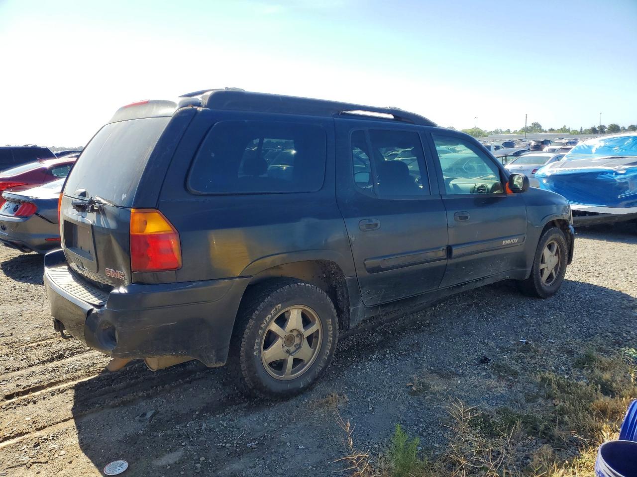 2003 Gmc Envoy Черный vin: 1GKES16S636136900