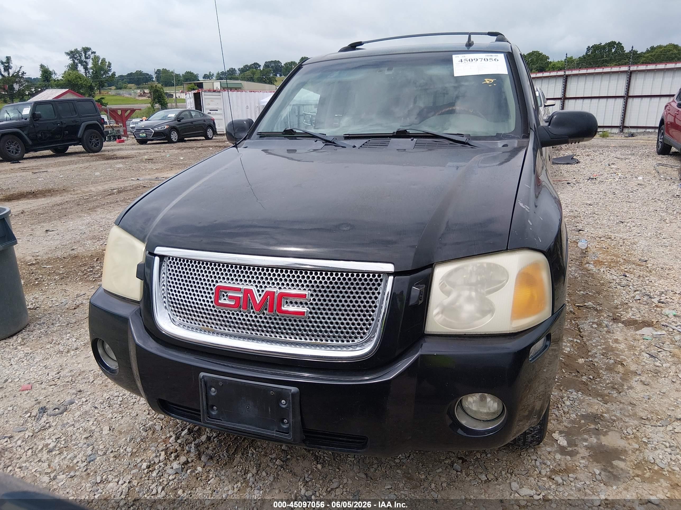 2006 Gmc Envoy Denali Black vin: 1GKET63M962239532