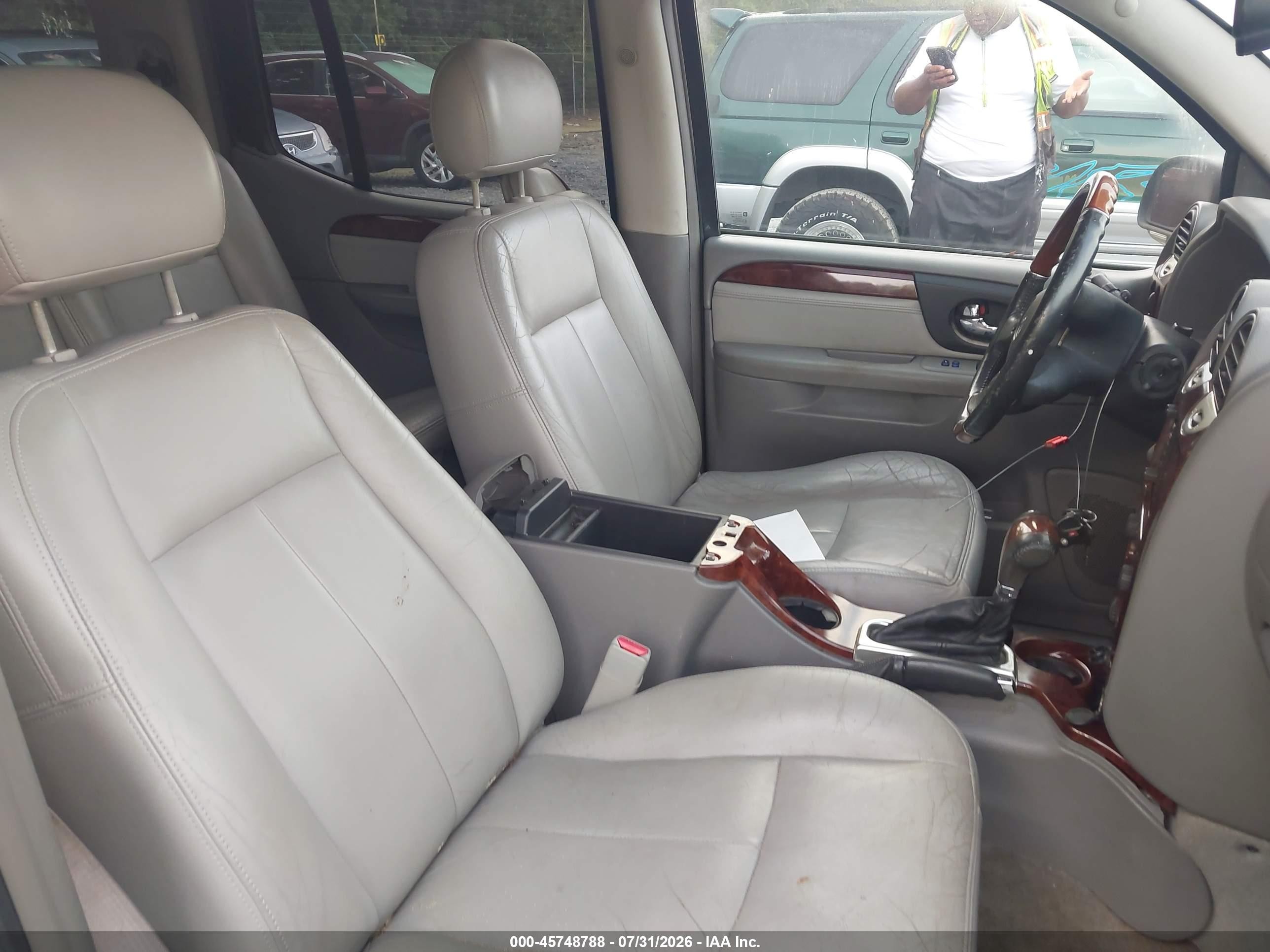 2006 Gmc Envoy Xl Denali Silver vin: 1GKET66M166102024