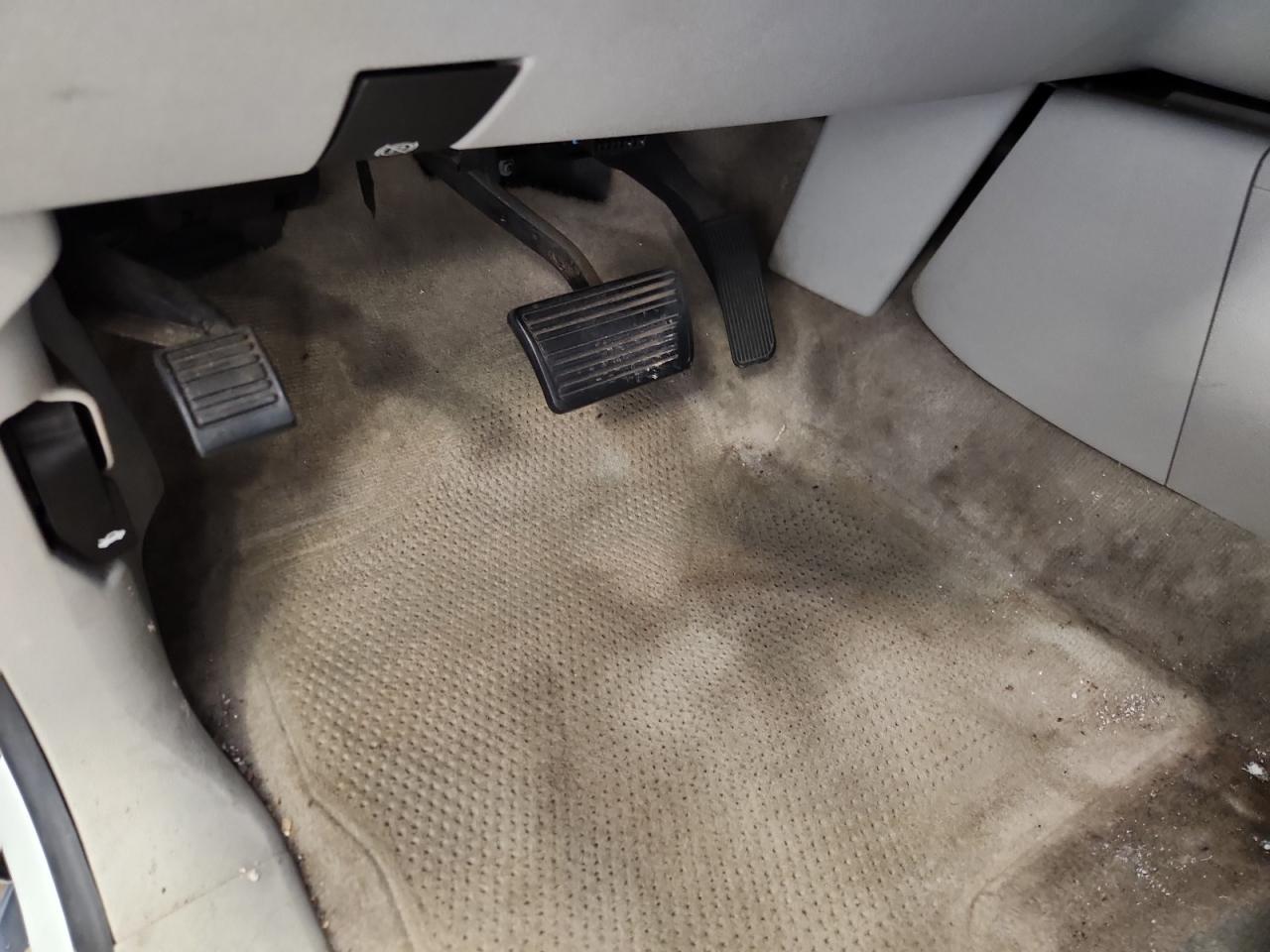 2007 Gmc Yukon White vin: 1GKFK13017J249471 Damage: Left Front Carpet, Stained, Permanent