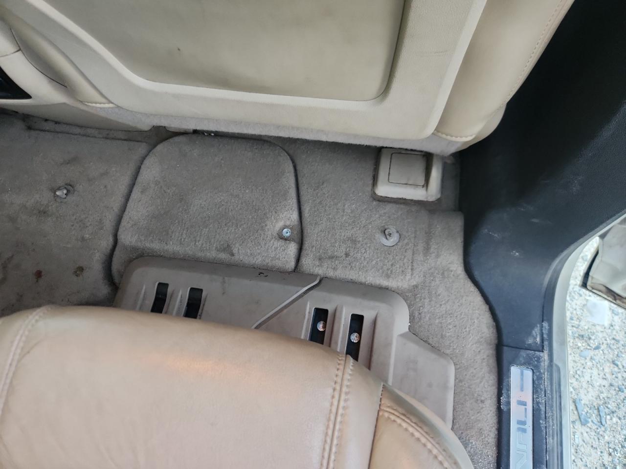 2012 Gmc Acadia Denali White vin: 1GKKRTED3CJ403310 Damage: Right Rear Carpet, Stained, Permanent