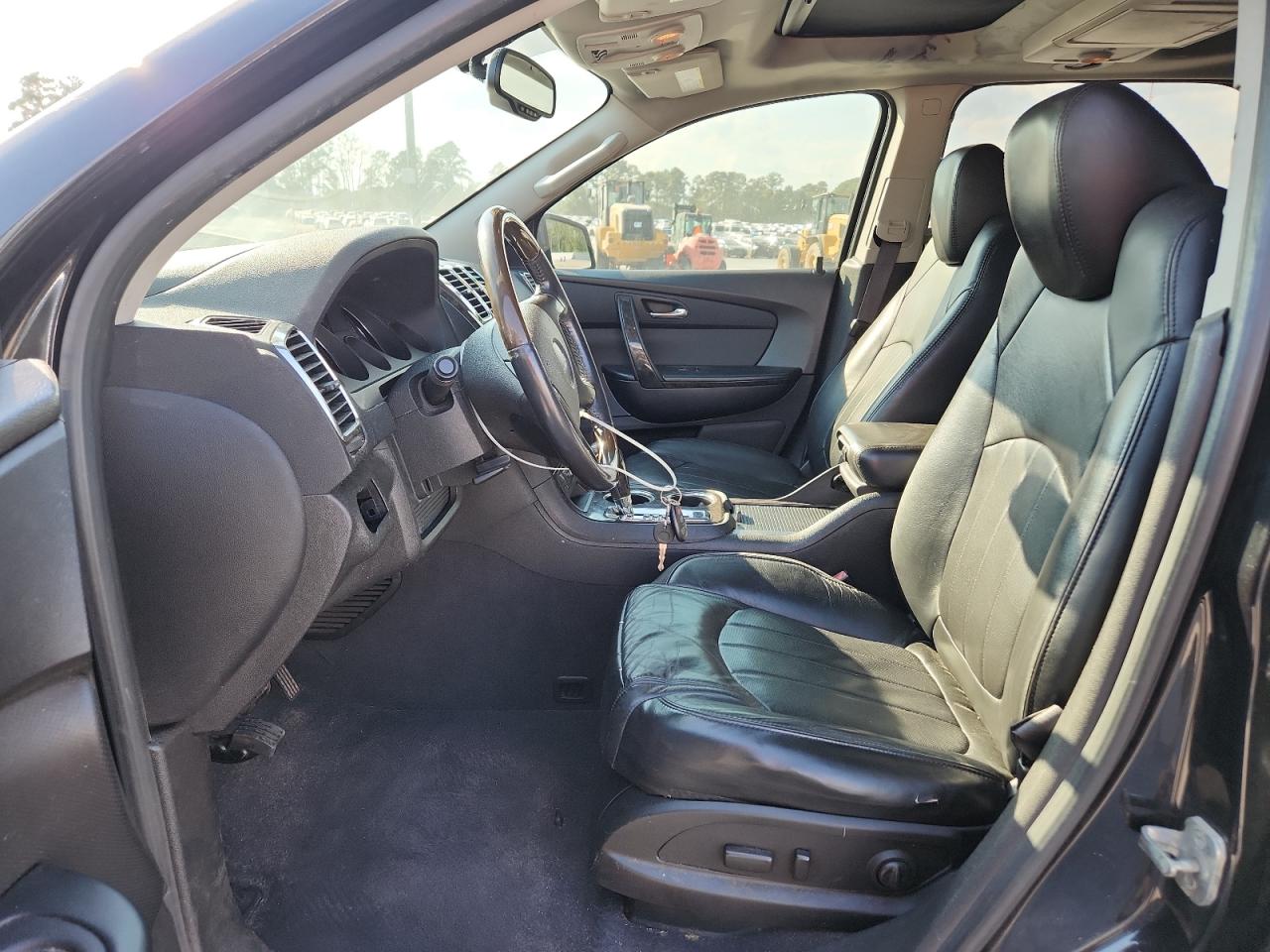 2011 Gmc Acadia Denali Charcoal vin: 1GKKVTED8BJ345852 Damage: Left Front Seat Cushion, Torn, 1/8 To 1/2 Inch