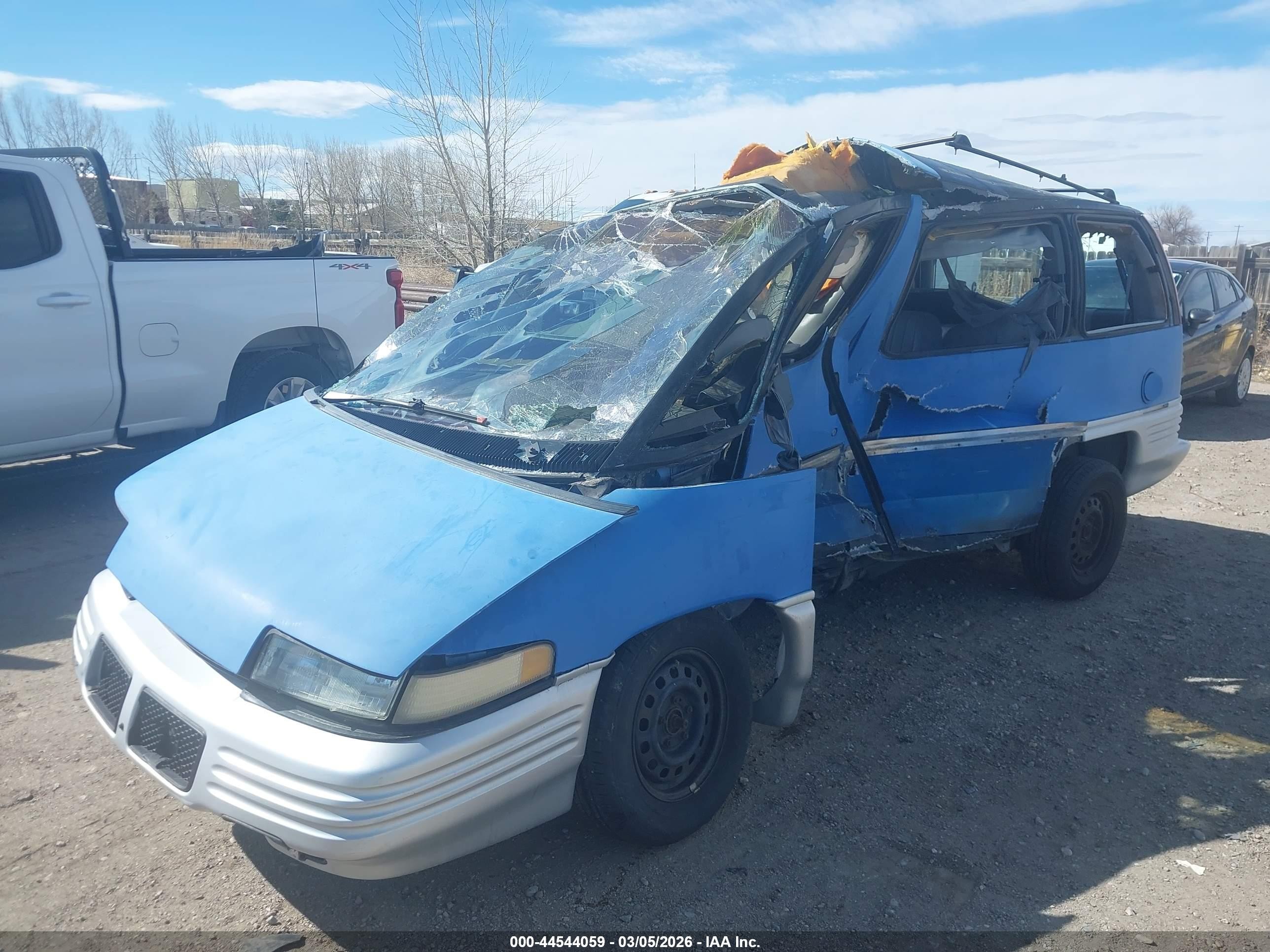 1990 Pontiac Trans Sport   Blue vin: 1GMCU06DXLT236455