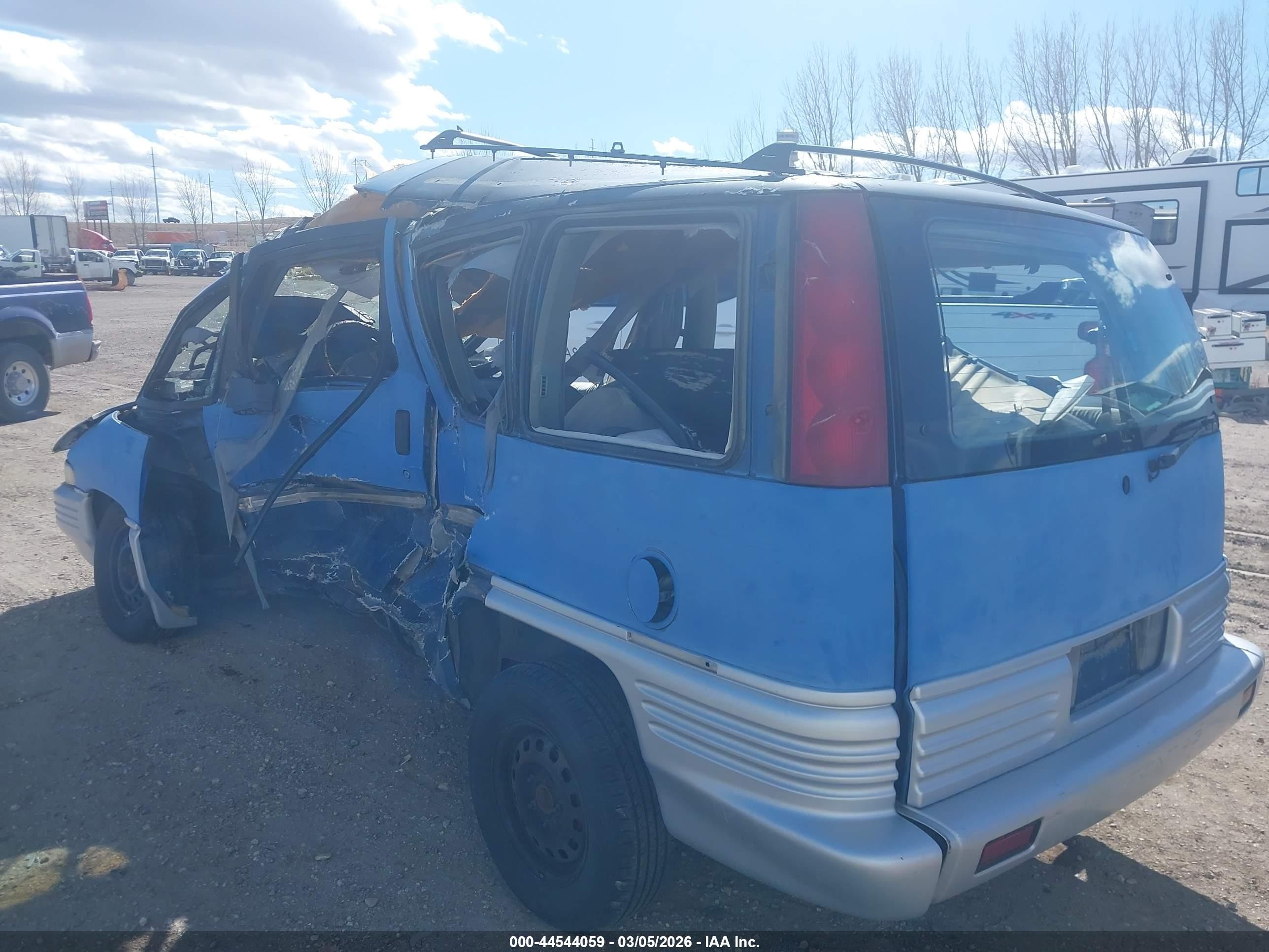 1990 Pontiac Trans Sport   Blue vin: 1GMCU06DXLT236455