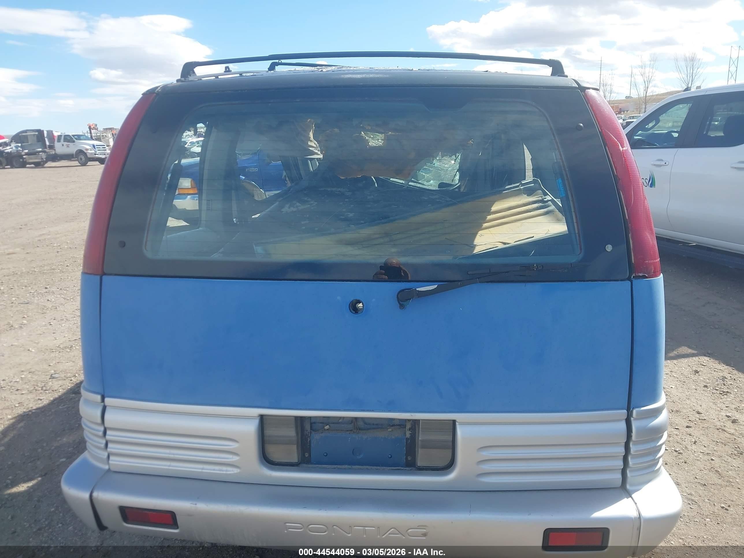 1990 Pontiac Trans Sport   Blue vin: 1GMCU06DXLT236455