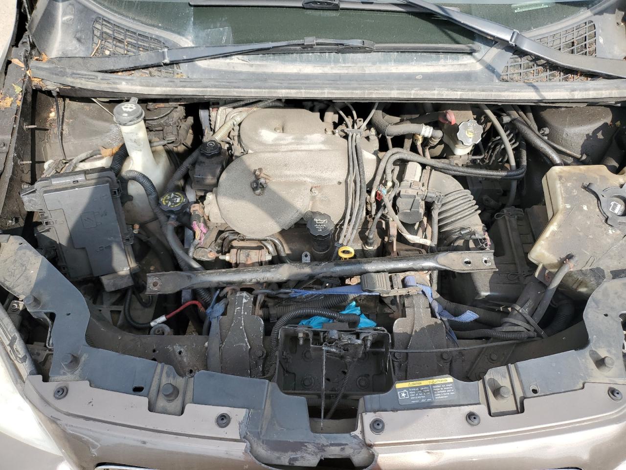 2007 Pontiac Montana Sv6   Коричневый vin: 1GMDU03187D192311