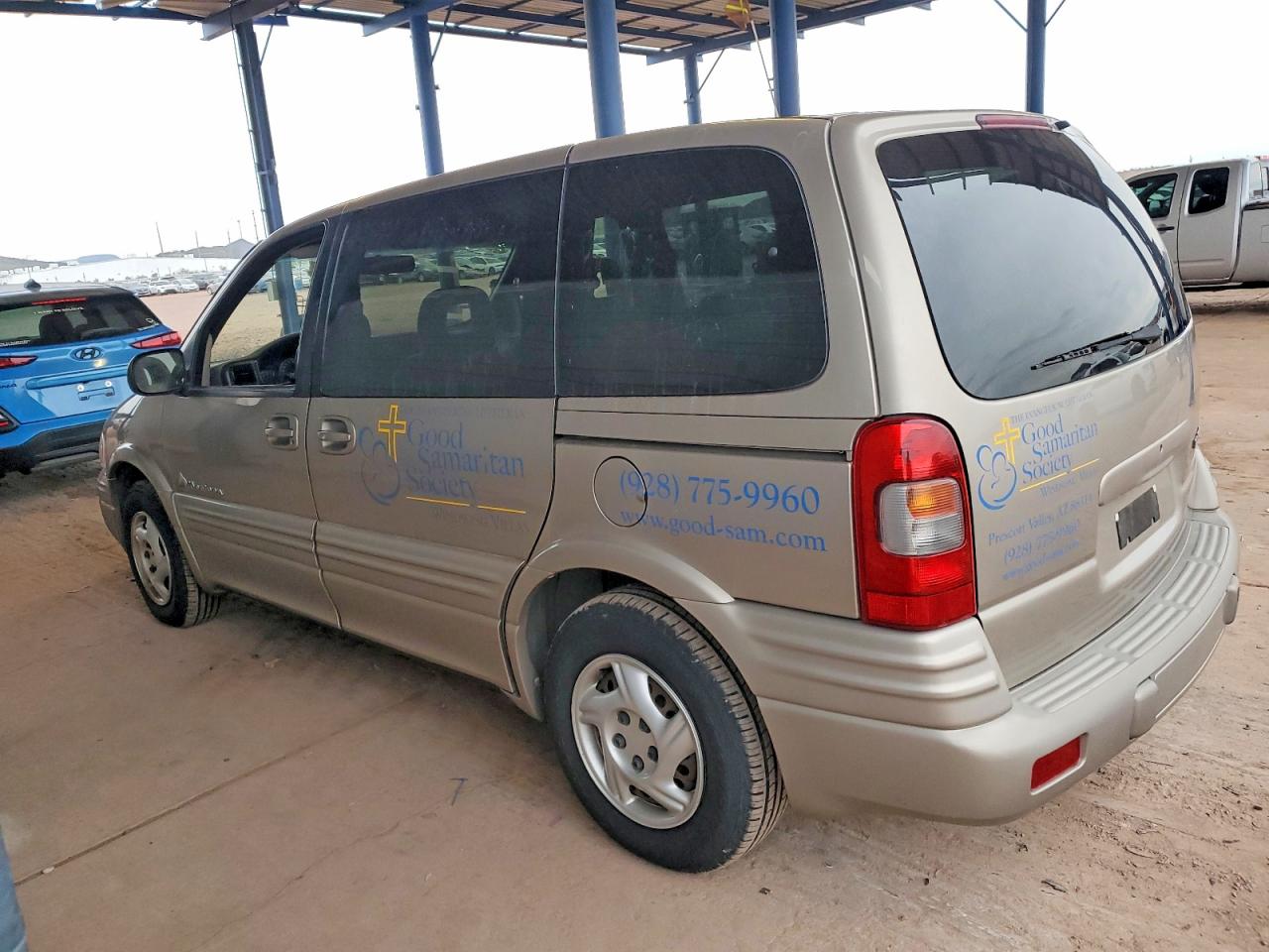 1999 Pontiac Montana / Trans Sport Tan vin: 1GMDU03E0XD131697