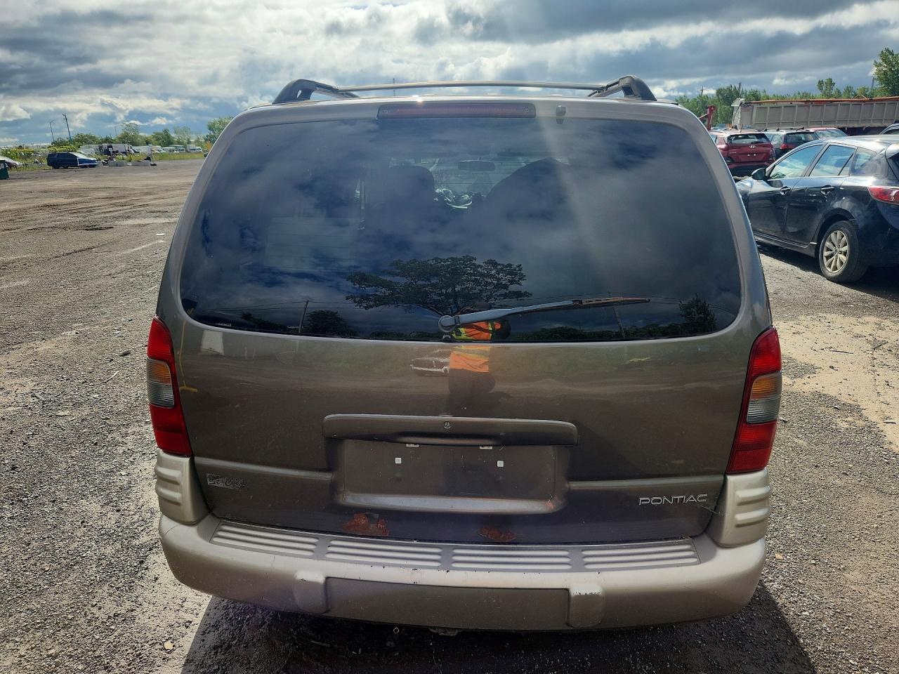 2003 Pontiac Montana Коричневый vin: 1GMDU03E23D237627