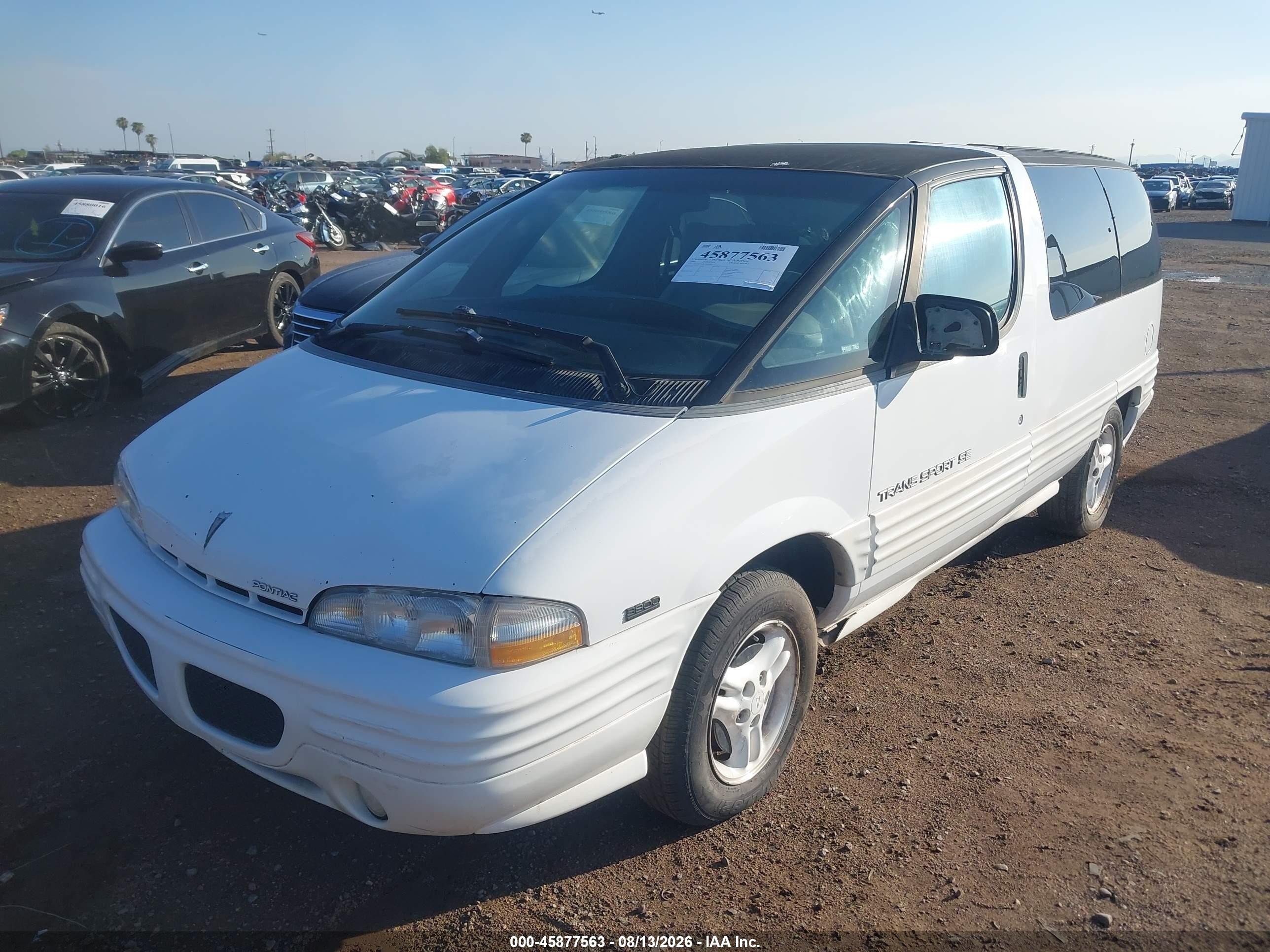 1995 Pontiac Trans Sport   White vin: 1GMDU06L7ST201611