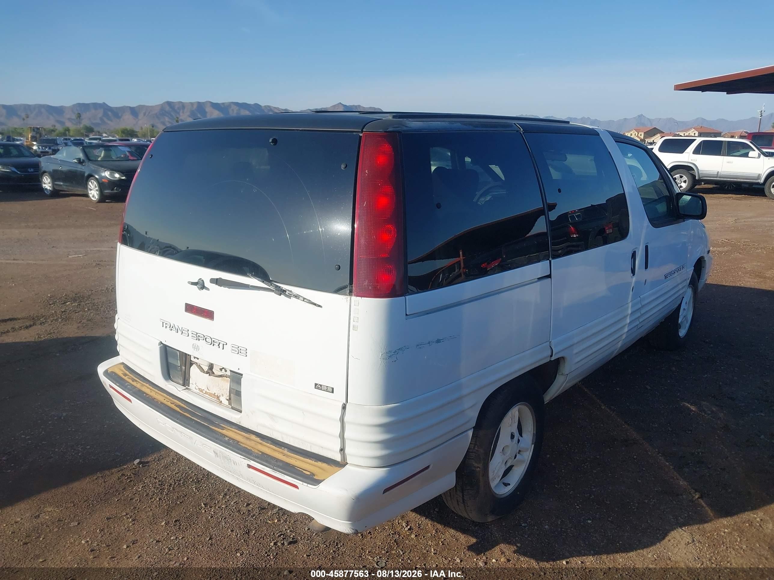 1995 Pontiac Trans Sport   White vin: 1GMDU06L7ST201611