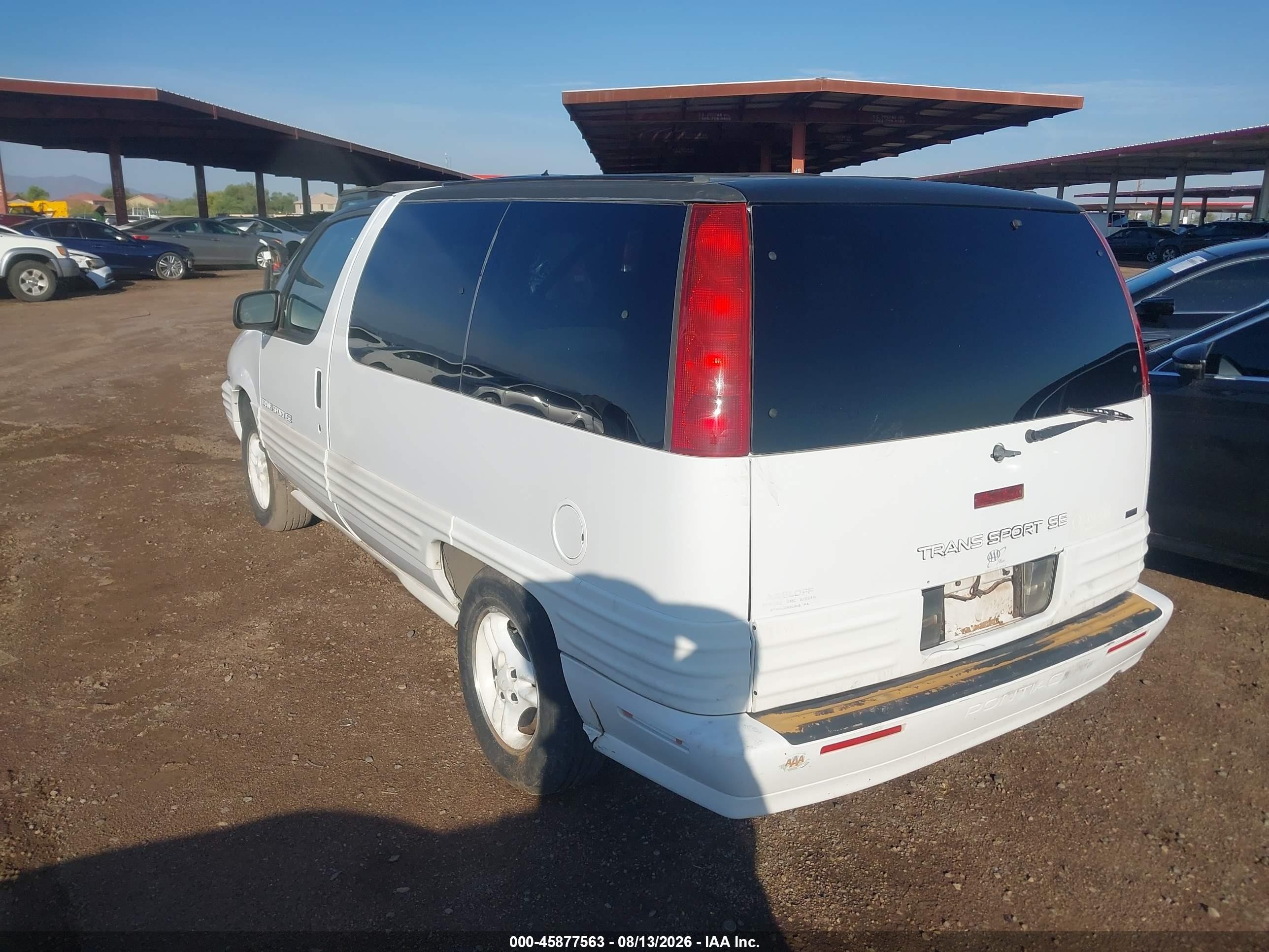 1995 Pontiac Trans Sport   White vin: 1GMDU06L7ST201611