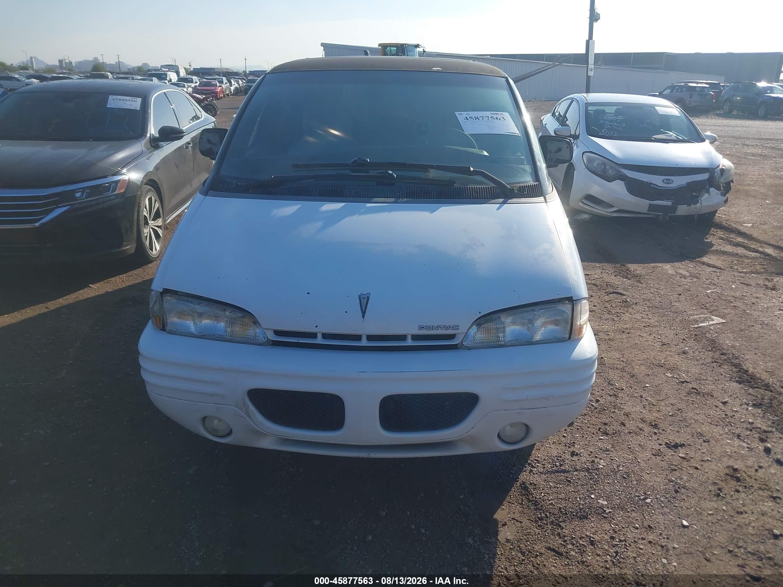 1995 Pontiac Trans Sport   White vin: 1GMDU06L7ST201611