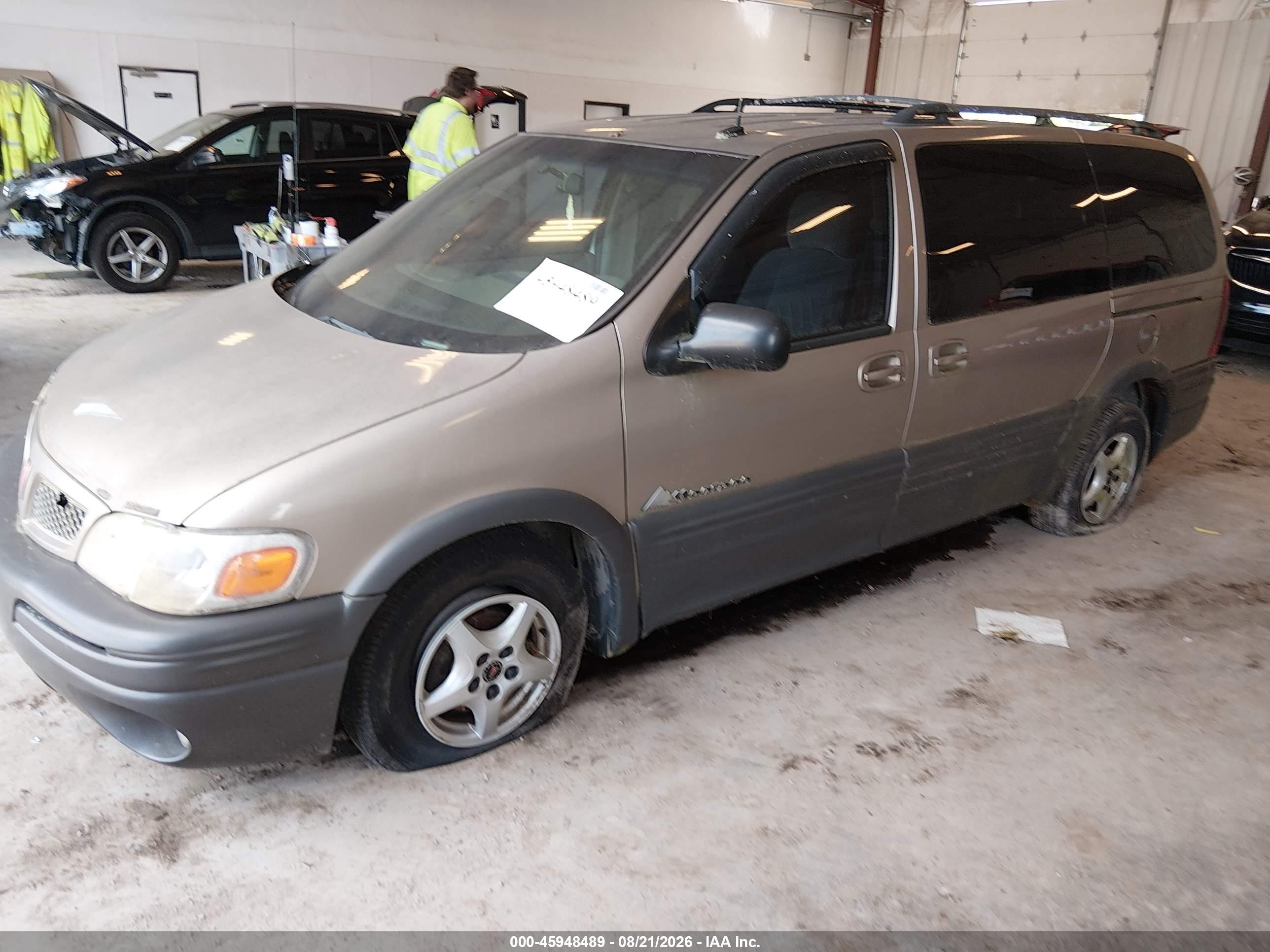 2004 Pontiac Montana M16 W/1sa Pkg. Tan vin: 1GMDX03E64D160365