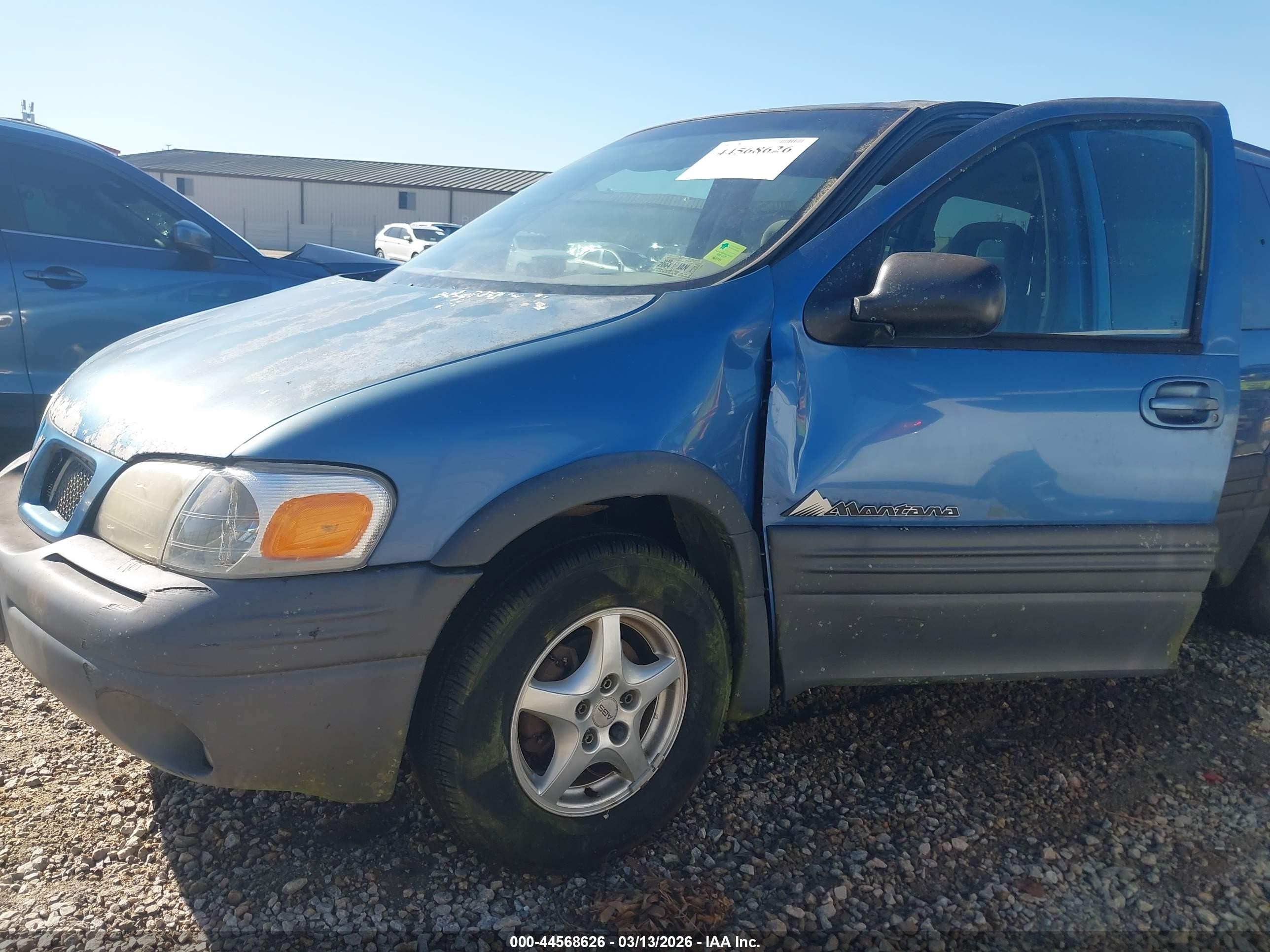 1999 Pontiac Montana   Blue vin: 1GMDX03E6XD196013