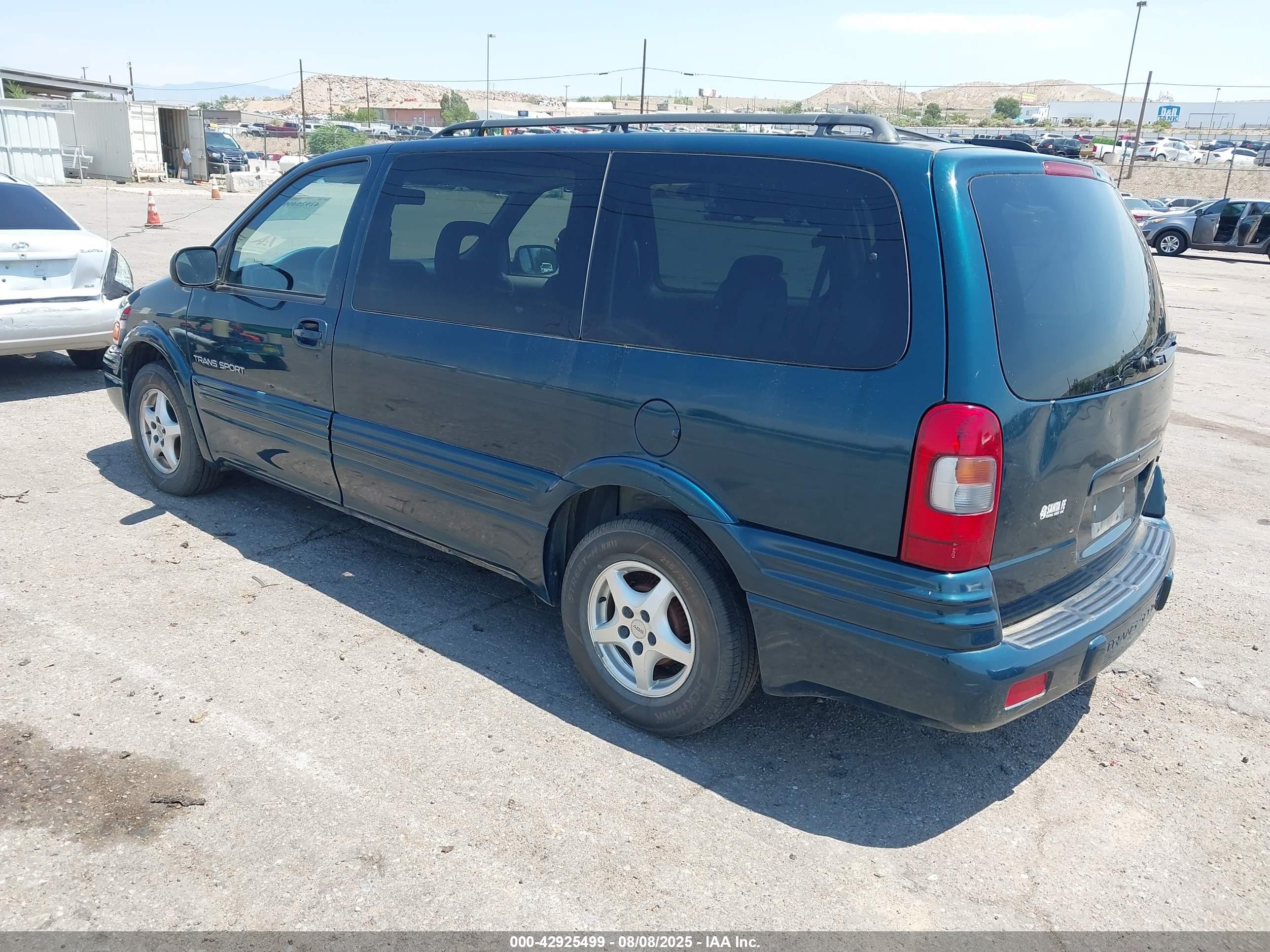 1997 Pontiac Trans Sport   Green vin: 1GMDX06E3VD250344