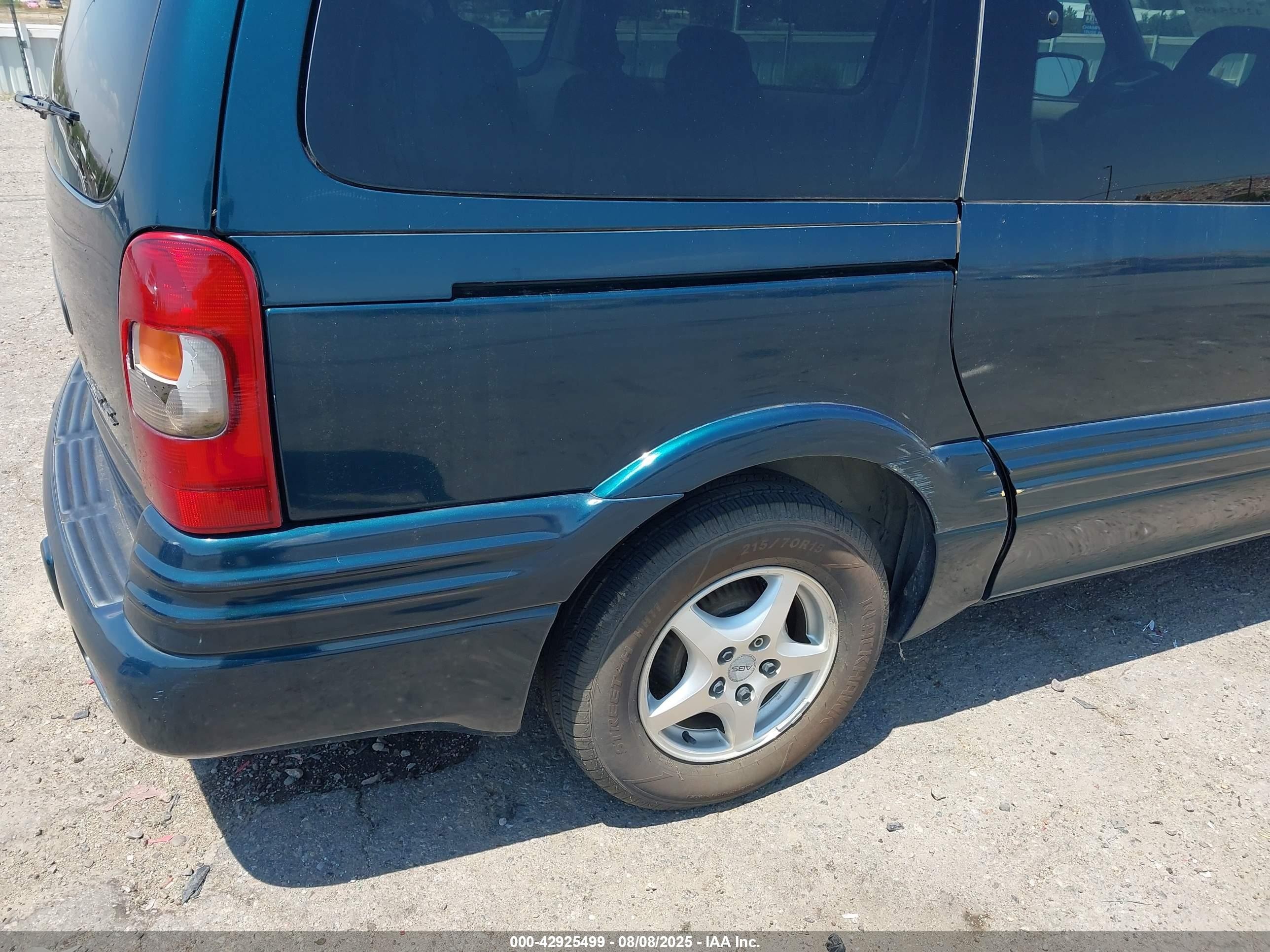 1997 Pontiac Trans Sport   Green vin: 1GMDX06E3VD250344