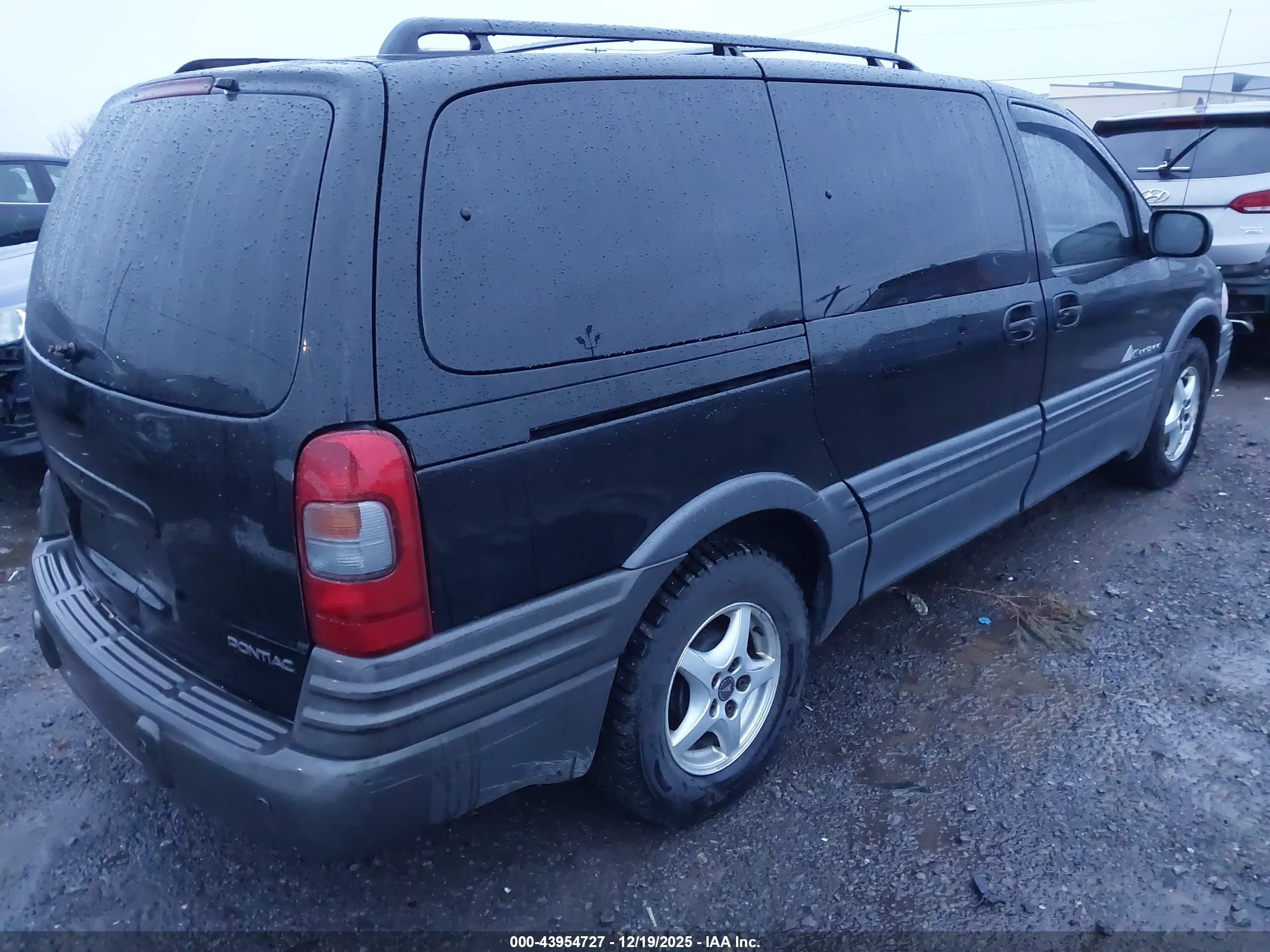 2002 Pontiac Montana M16 W/1se Pkg. Black vin: 1GMDX13EX2D323635