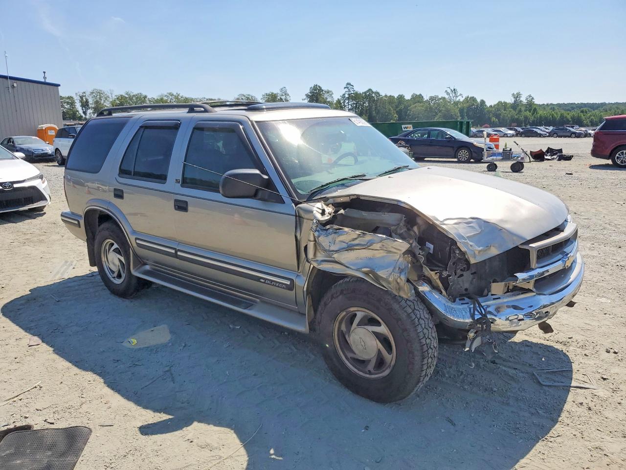 1999 Chevrolet Blazer Tan vin: 1GNDT13W8X2239784