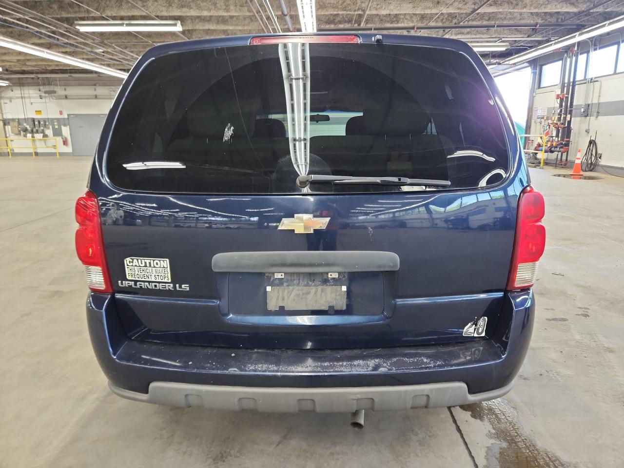 2006 Chevrolet Uplander Ls Blue vin: 1GNDU23L56D132168 Damage: Rear Bumper/Cover, Peeling, > 12 Inches