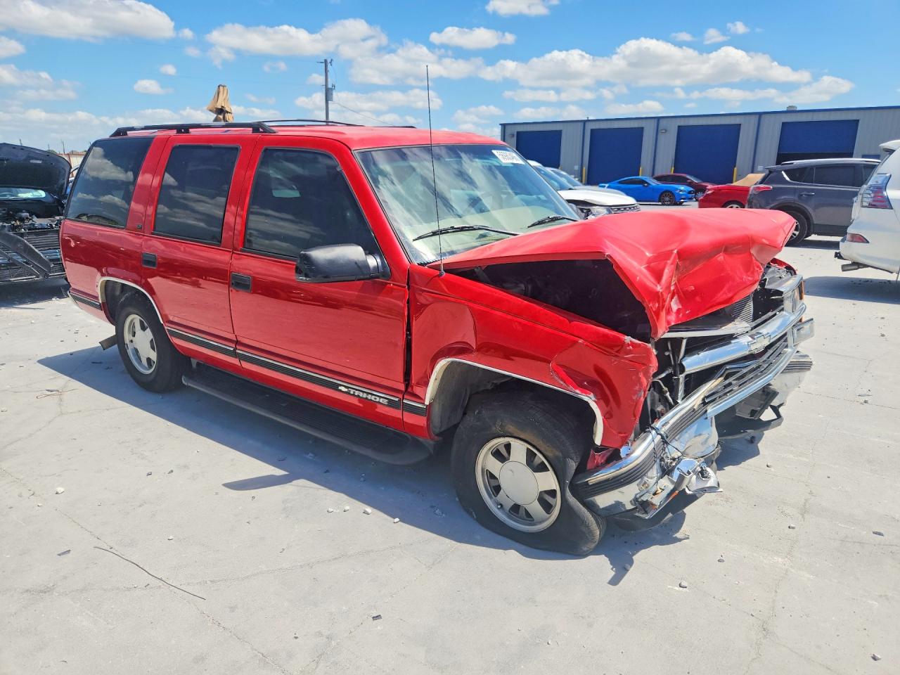 1999 Chevrolet Tahoe C1500 Красный vin: 1GNEC13R2XR101311