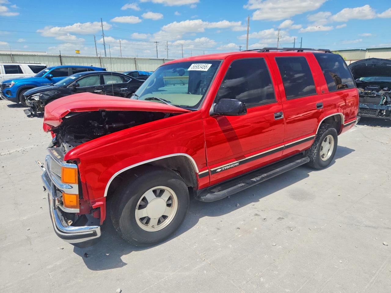 1999 Chevrolet Tahoe C1500 Red vin: 1GNEC13R2XR101311