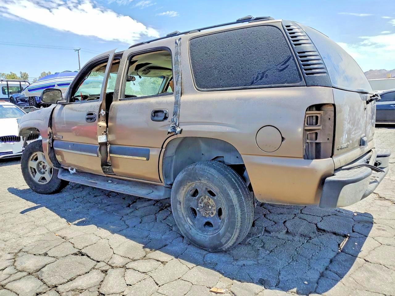 2003 Chevrolet Tahoe C1500 Желто-коричневый vin: 1GNEC13T03R133065