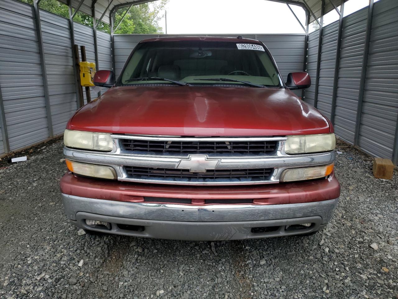 2003 Chevrolet Tahoe C1500 Burgundy vin: 1GNEC13ZX3J238764 Damage: Left Head Lamp, Faded, Repair Required