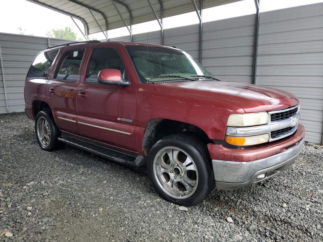 2003 Chevrolet Tahoe C1500 Burgundy vin: 1GNEC13ZX3J238764 Damage: Right Rear Wheel, Aftermarket, Replacement Required