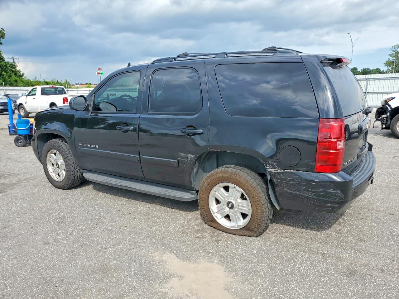 2009 Chevrolet Tahoe Black vin: 1GNEC23329R210839