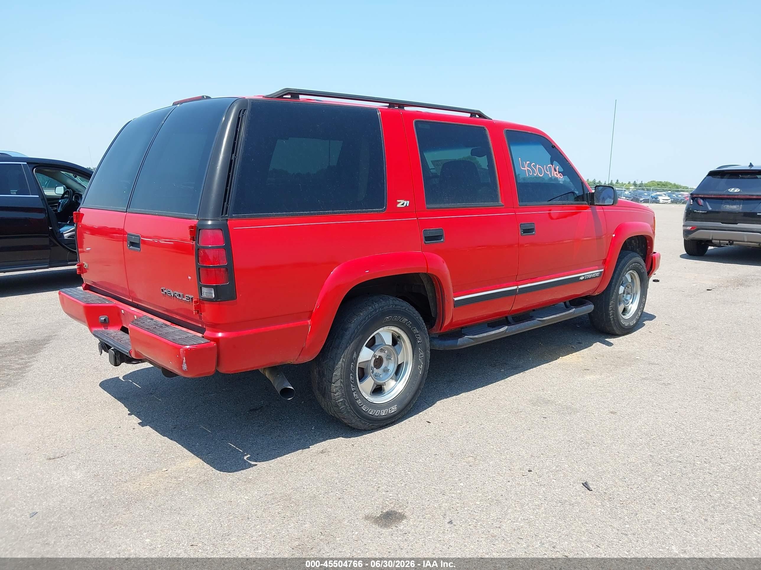 2000 Chevrolet Tahoe Z71 Red vin: 1GNEK13R0YR120671
