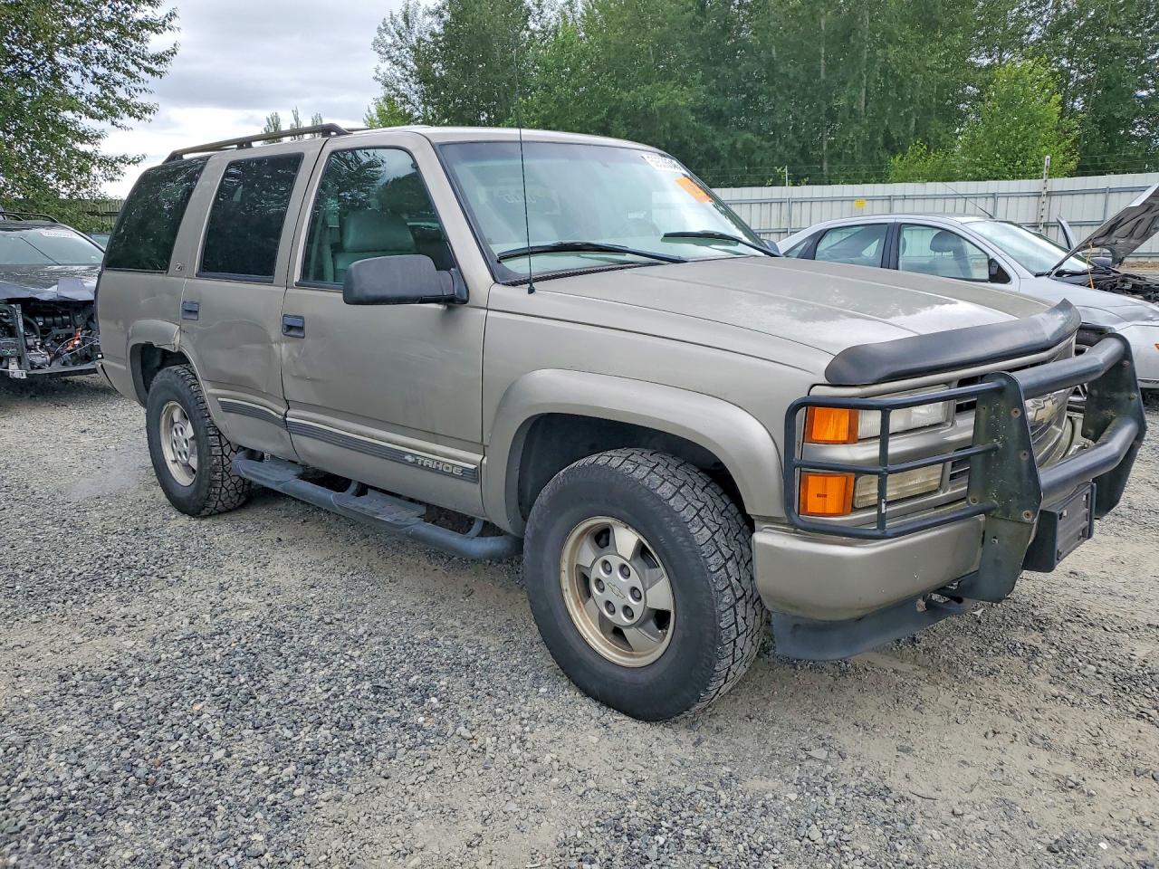 2000 Chevrolet Tahoe K1500 Tan vin: 1GNEK13R1YR147166