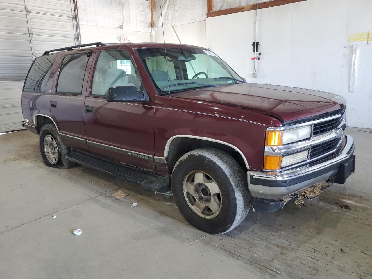 1999 Chevrolet Tahoe K1500 Бордовый vin: 1GNEK13RXXJ565075