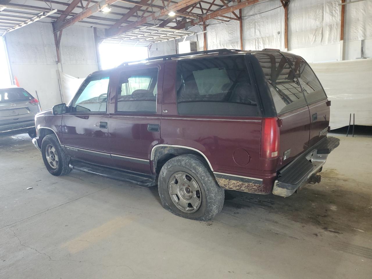 1999 Chevrolet Tahoe K1500 Бордовый vin: 1GNEK13RXXJ565075