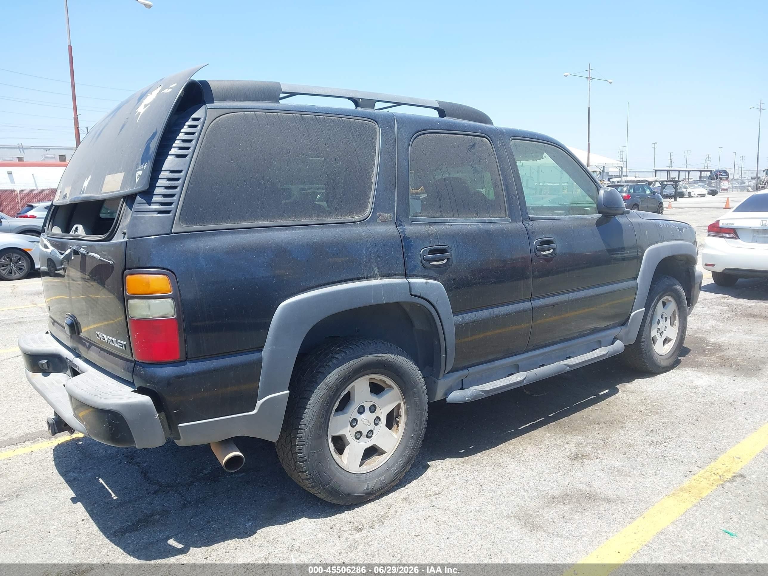 2004 Chevrolet Tahoe Z71 Black vin: 1GNEK13T24R301423