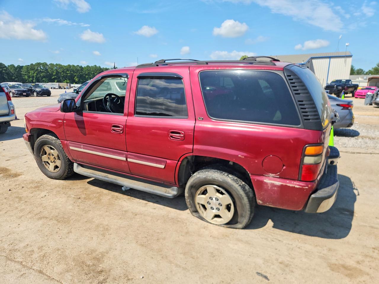 2005 Chevrolet Tahoe K1500 Maroon vin: 1GNEK13T25R143876