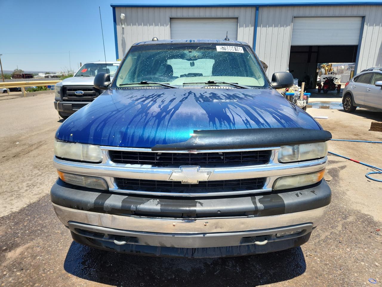 2005 Chevrolet Tahoe K1500 Teal vin: 1GNEK13T85R159709 Damage: Left Head Lamp, Faded, Repair Required
