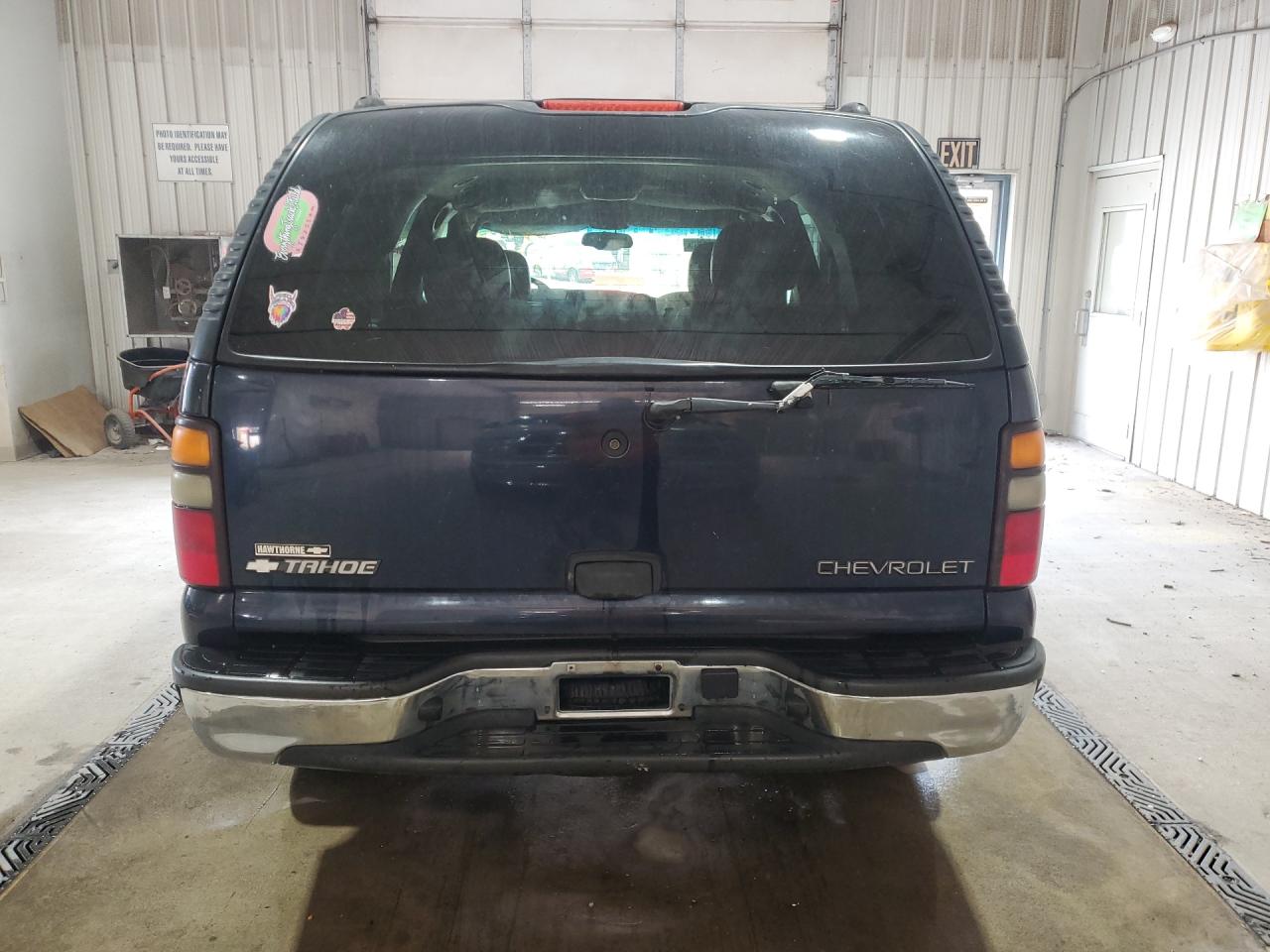 2004 Chevrolet Tahoe K1500 Blue vin: 1GNEK13T94J141457 Damage: Rear Metal Bumper Chrome, Bent, > 12 Inches