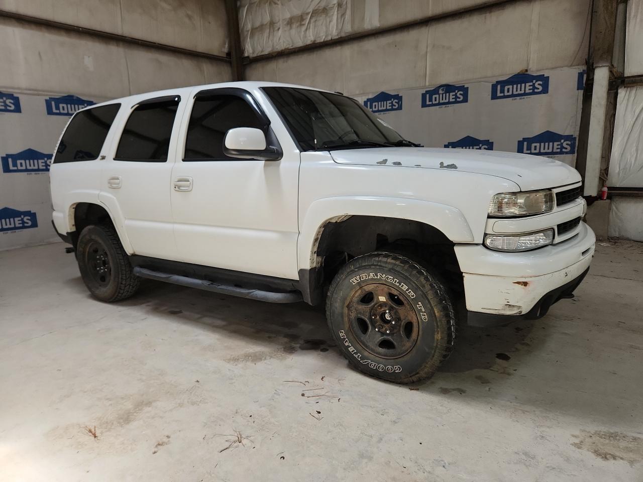 2003 Chevrolet Tahoe K1500 White vin: 1GNEK13Z63R256053 Damage: Hood, Peeling, > 12 Inches