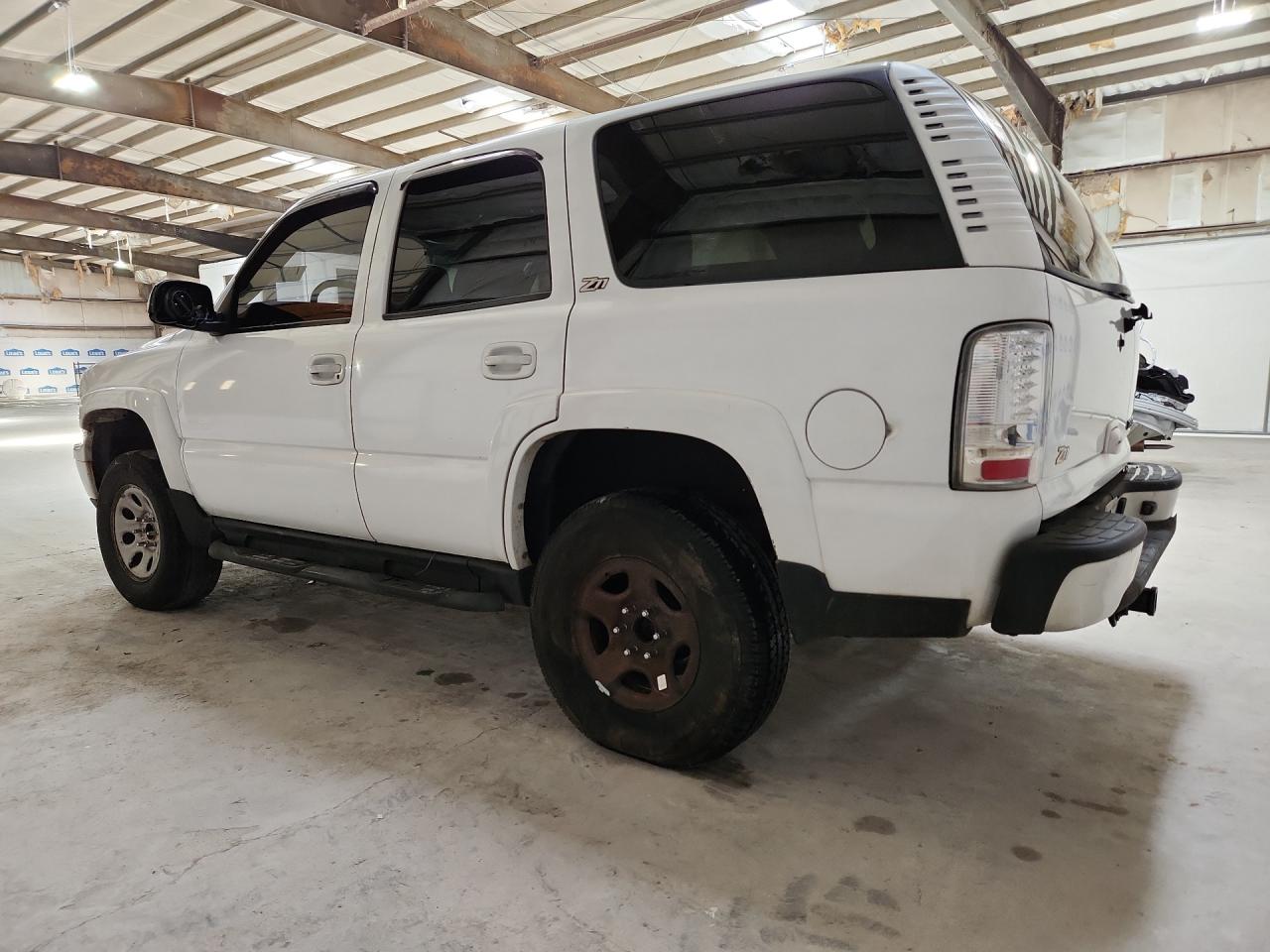 2003 Chevrolet Tahoe K1500 White vin: 1GNEK13Z63R256053 Damage: Left Rear Door, Dent(S) W/ Paint Dmg, 1 To 2 Inches