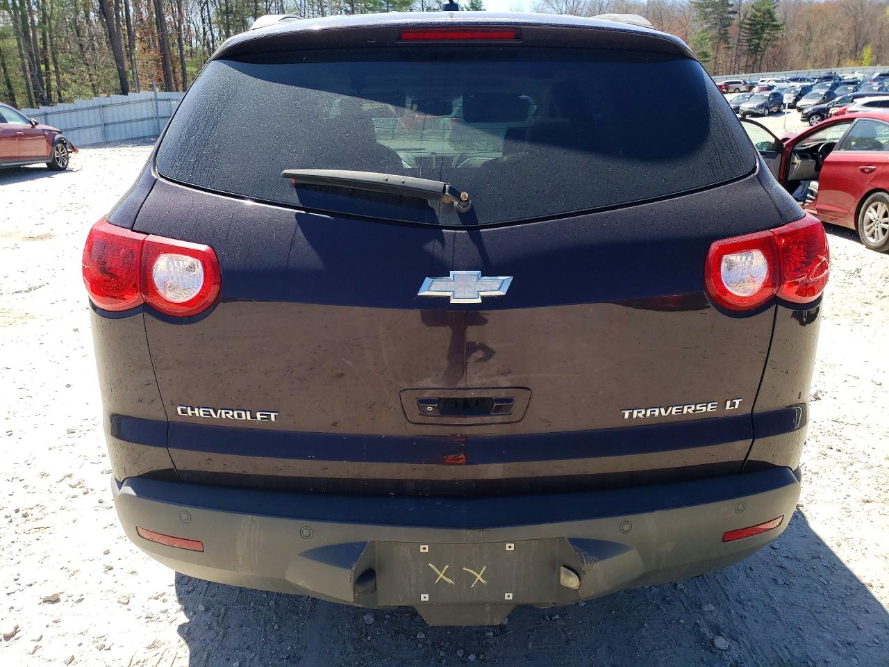 2009 Chevrolet Traverse Burgundy vin: 1GNEV23D89S161755